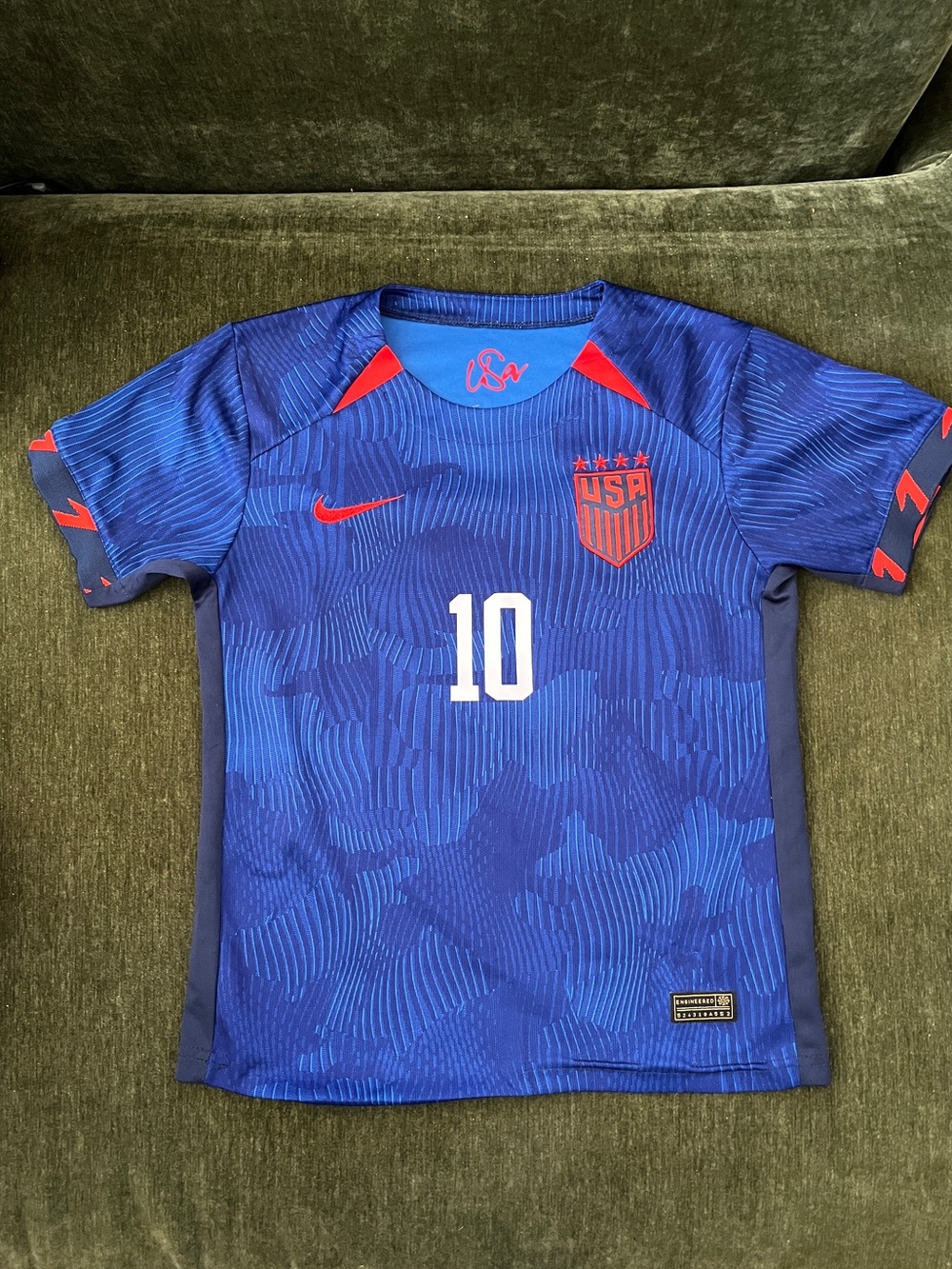 Nike Kids' Blue Soccer Jersey with Red Accents